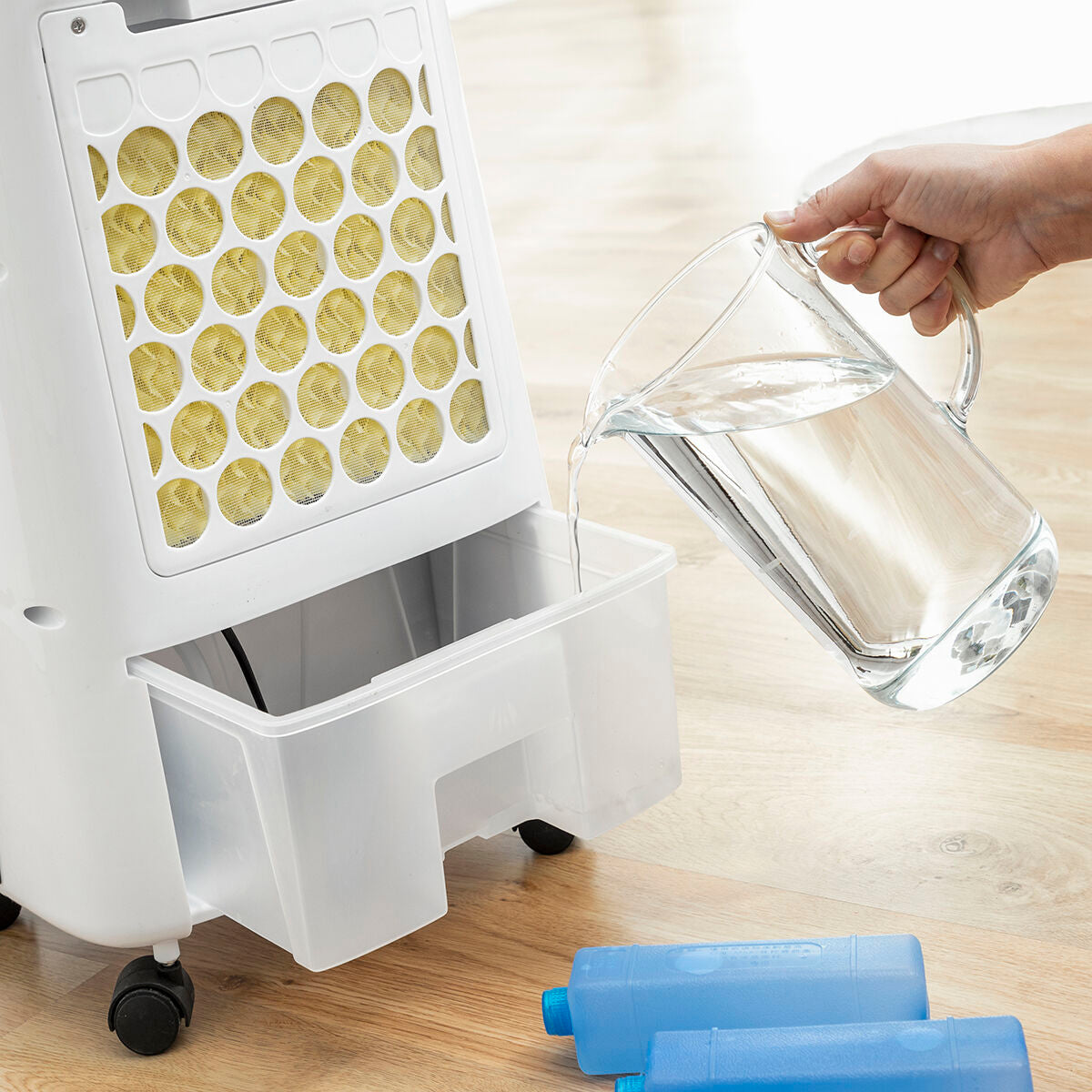 Finless air cooler with evaporative ionizers and LED lights