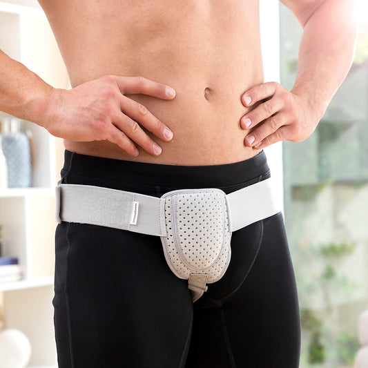 Adjustable inguinal hernia belt